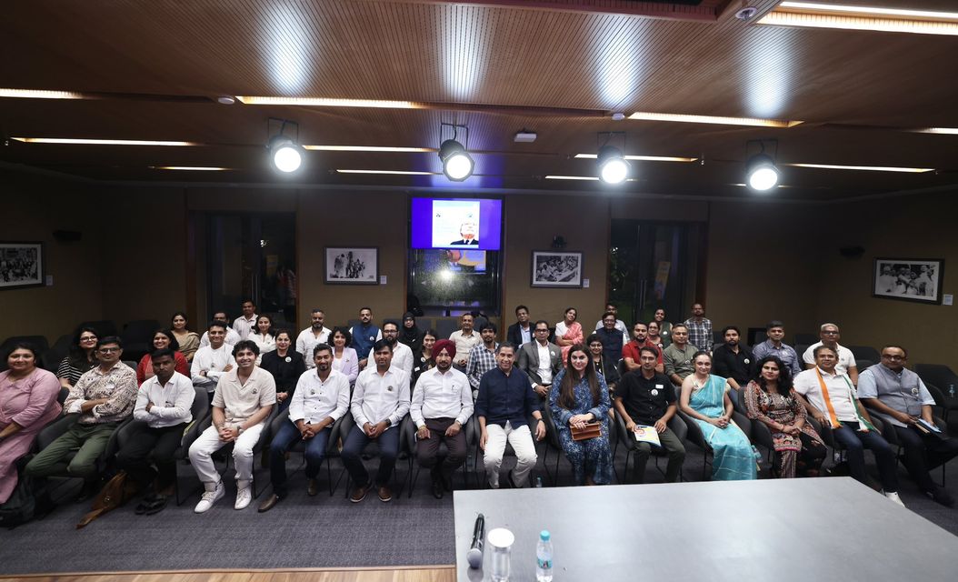 The first cohort of Fellows seated together in the auditorium