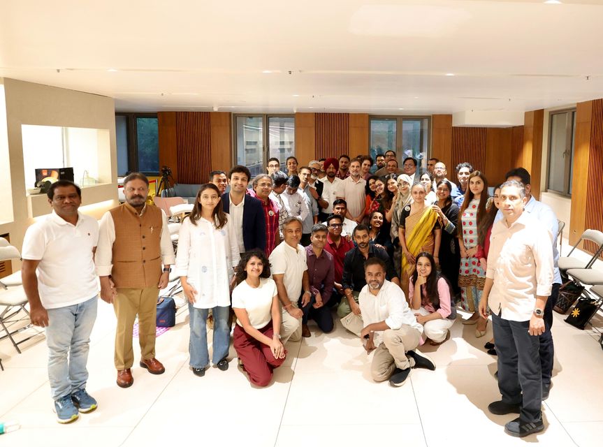 Group photograph of the first cohort at their graduation