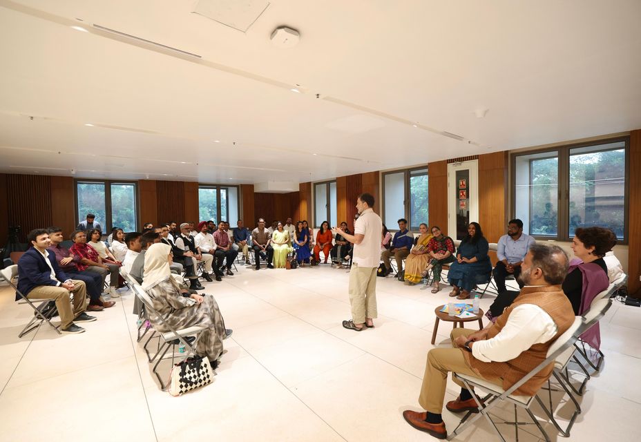 Fellows seated in a circle during the graduation interaction
